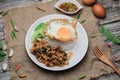 Thai Stir fried  basil with minced pork, chili and fried egg on topped rice. Royalty Free Stock Photo