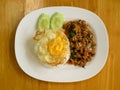 Thai stir fried basil with minced pork and fried egg eating with cooked rice Royalty Free Stock Photo