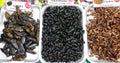 Thai street exotic food. Edible fried beetles, crickets