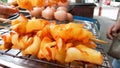 Thai squid skewers street food. Shot with cellphone.