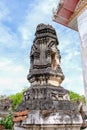 Thai Stucco pattern on the ancient pagoda or Prang Side view with blue sky Royalty Free Stock Photo