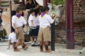 Thai students boys and girls scouts walking visit and respect praying buddha statue at Wat Pho Kao Ton in Sing Buri , Thailand