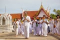 Thai students wear white clothes making a merit at the temple in Pranburi, Thailand July 21,2017