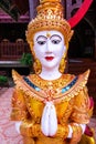 Thai style angel statue in Nantaram temple Royalty Free Stock Photo