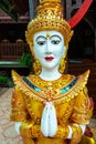 Thai style angel statue in Nantaram temple Royalty Free Stock Photo