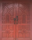 Thai style antique carved wooden door of teak wood Royalty Free Stock Photo