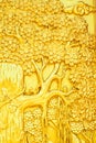 Thai style art golden tree carving on temple door Royalty Free Stock Photo