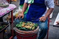 Thai style charcoal grill sticky rice dessert in banana leaf at Royalty Free Stock Photo