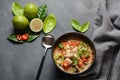 Thai style coconut milk soup-Tom Kha Gai with chicken, mushrooms, galangal, lime leaves, lemongrass, chili peppers Royalty Free Stock Photo