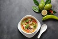 Thai style coconut milk soup-Tom Kha Gai with chicken, mushrooms, galangal, lime leaves, lemongrass, chili peppers Royalty Free Stock Photo