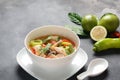 Thai style coconut milk soup-Tom Kha Gai with chicken, mushrooms, galangal, lime leaves, lemongrass, chili peppers Royalty Free Stock Photo