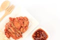 Thai style fried chicken with Red Spicy Sauce and Sticky rice isolated on wooden table. Royalty Free Stock Photo