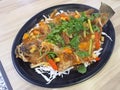 Thai style fried seabass in sweet and sour sauce