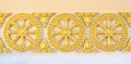 Thai style golden molding wheel of life pattern Royalty Free Stock Photo