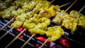 Thai style roast pork skewers Pork steak grilled on charcoal for sell at street market. Bangkok, Thailand. Selective focus. Royalty Free Stock Photo