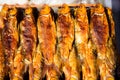 Thai style smoked fish on skewers Royalty Free Stock Photo