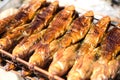 Thai style smoked fish on skewers Royalty Free Stock Photo