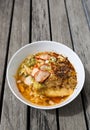 Thai style spicy egg noodle soup with roasted pork Royalty Free Stock Photo