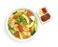 Thai Sukiyaki Soup with Seafood Shrimps,Squids,Egg and Vegetables Carved Carrots flowers shape served Sauce Royalty Free Stock Photo