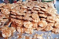 Thai sweet crispy rice cake with crane sugar, Nang let for sell at at Wat Takien floating market, Nonthaburi, Thailand