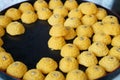 Thai sweet dessert, name is Tongeak or Yellow sweetmeats with a piece of gold foil on top, Tha