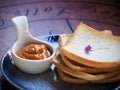 Thai Tea custard eat with crispy bread. Royalty Free Stock Photo