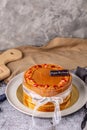 Thai tea layer cake decorated with strawberry and white ribbon for birthday cake. Royalty Free Stock Photo