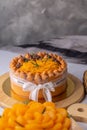 Thai tea layer cake decorated with white ribbon for birthday. Royalty Free Stock Photo