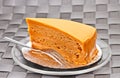 Thai tea soft layer cake on glass plate 1 Royalty Free Stock Photo