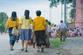 Thai teachers and students in candle parade, Buddhist lent cand