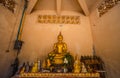 Thai temple interior with Buddha. Wat Patong Suwankeereewong Temple Phuket, Thailand.