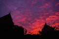 Thai temple silhouette, dramatic sky