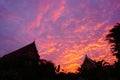 Thai temple silhouette, dramatic sky