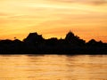 Thai temple `Wat Thai` evening waterfront river side Mekong River
