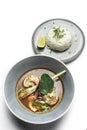 thai tom yam kung spicy soup with prawns on white background