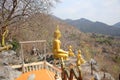 Thai top temple, he has many large golden Buddha images. Natural background Royalty Free Stock Photo