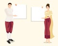 Thai traditional couple in red dress holding empty blank white board for text