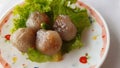 Thai Traditional Desert,Tapica Ball Made From Glutionous Rice filled with Minced Pork and sweet pickled Daikon Redish.