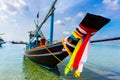 Thai traditional Fishing boat decorated with colorful ribbons Royalty Free Stock Photo