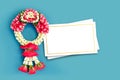 Thai traditional jasmine garland and blank white greeting card Royalty Free Stock Photo