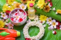 Thai traditional jasmine garland and Colorful flower in water bo Royalty Free Stock Photo