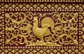 Thai traditional patterns Golden stucco wall in the temple background of thailand Royalty Free Stock Photo