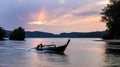 Thai traditional wooden longtail boats at the sunset in Krabi province. Thailand. Royalty Free Stock Photo