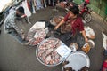 Thai vendors sell fresh fish in a morning market. in rural areas of Thailand.