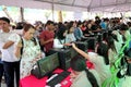 Thai voters check their name lists during the advance voted.