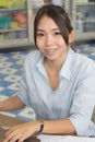 Thai Woman blue shirt smile Royalty Free Stock Photo