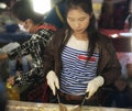 Thai woman cooking