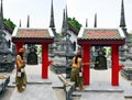 Thai woman knell bell in Wat Phra Mahathat Woramahawihan Royalty Free Stock Photo