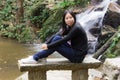 Thai woman with Mae Kam Pong waterfall, Chiangmai Thailand