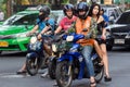 Thai woman moto taxi passenger
